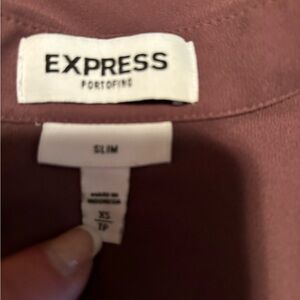 Dressy sleeveless blouse it’s not red but a mauve color